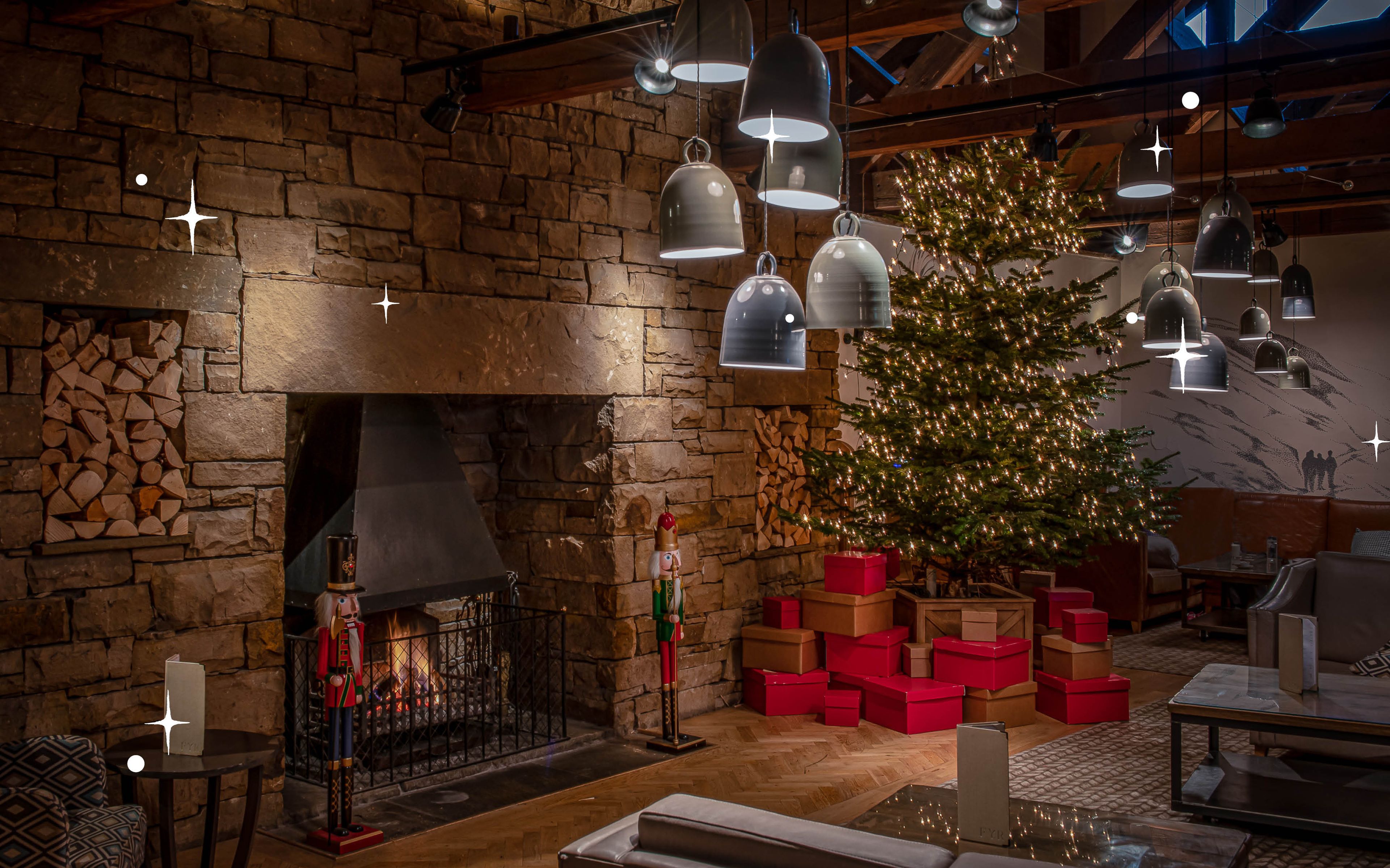 Christmas tree and roaring fire in North Lakes' reception area